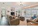 Living room with a view of the pool at 2159 Warwick Dr, Oldsmar, FL 34677