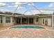 Screened-in pool with brick patio offers a private outdoor retreat for relaxation and entertaining at 2159 Warwick Dr, Oldsmar, FL 34677