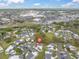 Community aerial view highlights proximity to shopping centers, mature trees, and neighborhood at 2647 Barksdale Ct, Clearwater, FL 33761