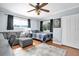 Bedroom featuring a bed, sitting area, natural light, and closet providing ample space for relaxation at 2647 Barksdale Ct, Clearwater, FL 33761