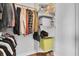 Organized walk-in closet featuring hanging storage, shelving, and ample space for clothes and personal items at 2647 Barksdale Ct, Clearwater, FL 33761