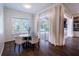 Bright breakfast nook with a glass table set overlooking the pool at 3027 Key Harbor Dr, Safety Harbor, FL 34695