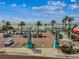 Entry to the beach and parking area, framed by decorative sign posts at 315 Medallion Blvd # E, Madeira Beach, FL 33708