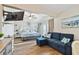 Charming bedroom featuring a ceiling fan and coastal-themed decor at 315 Medallion Blvd # E, Madeira Beach, FL 33708