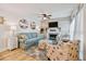 Cozy living room with beach-themed decorations and comfortable seating at 315 Medallion Blvd # E, Madeira Beach, FL 33708