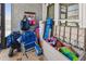 Enclosed patio with tile floor and outdoor storage for beach equipment and supplies at 315 Medallion Blvd # E, Madeira Beach, FL 33708