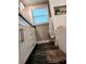 A bathroom with modern fixtures, a sleek vanity, and a minimalist design at 3217 W Lawn Ave, Tampa, FL 33611