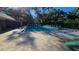 Community pool area with ample lounge seating and sunbathing area at 3527 Greenglen Cir, Palm Harbor, FL 34684