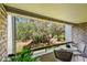 Relaxing balcony overlooking the golf course and trees at 36750 Us 19 N # 20211, Palm Harbor, FL 34684