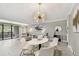 Bright living room with contemporary decor, modern furnishings, and a balcony at 36750 Us 19 N # 20211, Palm Harbor, FL 34684