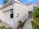 Front exterior view showing the garage, front door, walkway, and the house number at 4316 Sunray Ct # 34, Tampa, FL 33615