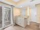 Kitchen area with breakfast island featuring granite countertops and stainless steel appliances at 4316 Sunray Ct # 34, Tampa, FL 33615