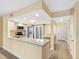 Open-concept kitchen with granite countertops, stainless steel appliances, and seamless flow to adjacent rooms at 4316 Sunray Ct # 34, Tampa, FL 33615