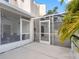 Enclosed patio featuring a screened in porch, allowing for enjoyment of the outdoors bug free at 4316 Sunray Ct # 34, Tampa, FL 33615