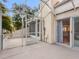 Spacious screened patio with view into the home and overlooking trees, creating a serene outdoor living area at 4316 Sunray Ct # 34, Tampa, FL 33615