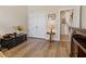 This bedroom features neutral walls, laminate flooring and a set of double closets at 4839 Pointe O Woods Dr, Wesley Chapel, FL 33543