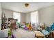 Bright bedroom with a seating area, desk, and lots of natural light at 5050 68Th N Way, St Petersburg, FL 33709