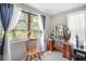 Bright and airy bedroom with large windows, natural light, and charming decor at 5050 68Th N Way, St Petersburg, FL 33709