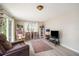 Bright and airy living room with comfortable seating and sliding door access to the outside at 5050 68Th N Way, St Petersburg, FL 33709