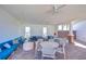 Inviting clubhouse patio with comfortable seating, creating a relaxing space for residents at 5325 Thistle Field Ct, Wesley Chapel, FL 33545
