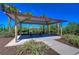 The open-air picnic pavilion features a table and seating, perfect for outdoor gatherings at 5325 Thistle Field Ct, Wesley Chapel, FL 33545