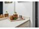 Bathroom vanity with decorative accents, neutral countertops and cabinets at 5950 Pelican Bay S Plz # 603, Gulfport, FL 33707