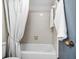 Shower over tub with white tile at 5950 Pelican Bay S Plz # 603, Gulfport, FL 33707