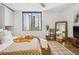 Inviting bedroom with natural light, tasteful decor, and comfortable furnishings at 5950 Pelican Bay S Plz # 603, Gulfport, FL 33707