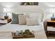 Bright bedroom detail showcasing the bed with decorative pillows at 5950 Pelican Bay S Plz # 603, Gulfport, FL 33707