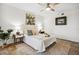 Cozy bedroom with stylish decor, ceiling fan, and comfortable bedding at 5950 Pelican Bay S Plz # 603, Gulfport, FL 33707
