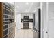 Well-lit kitchen features stainless steel appliances and modern finishes and decor at 5950 Pelican Bay S Plz # 603, Gulfport, FL 33707
