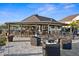 Relax on the outdoor patio with a fire pit and plenty of seating at the community clubhouse at 5950 Pelican Bay S Plz # 603, Gulfport, FL 33707