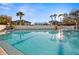 Enjoy the inviting community pool with its sparkling water and sunny surroundings at 5950 Pelican Bay S Plz # 603, Gulfport, FL 33707