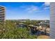 Expansive view from a balcony, capturing a beautiful lake and surrounding cityscape at 5950 Pelican Bay S Plz # 603, Gulfport, FL 33707