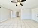 Large living room featuring tile floors and neutral paint, offering versatility at 601 N Keene Rd # P9, Clearwater, FL 33755