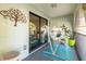 Private balcony with relaxing hammock, comfortable seating, and serene outdoor view at 6311 Bayside Dr, New Port Richey, FL 34652