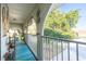 Charming balcony with textured walls, arches, and relaxing outdoor decor and view at 6311 Bayside Dr, New Port Richey, FL 34652