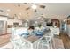 Open concept kitchen and dining area with modern appliances and a stylish dining table set at 6311 Bayside Dr, New Port Richey, FL 34652