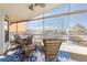 Screened lanai with views of the water, and comfortable seating at 6311 Bayside Dr, New Port Richey, FL 34652
