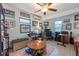 Functional home office with desk, keyboard, ample storage, and natural light at 6311 Bayside Dr, New Port Richey, FL 34652