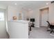 Spacious loft area with comfortable seating and a study nook at 6827 Citrus Creek Ln, Tampa, FL 33625