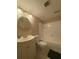 Clean bathroom with a vanity, ample lighting, and a shower-tub combination at 7506 Presley Pl # 108, Tampa, FL 33617
