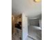 Open concept living room adjacent to the kitchen with lots of light at 7506 Presley Pl # 108, Tampa, FL 33617