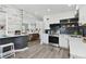 Modern kitchen featuring stainless steel appliances, sleek cabinetry, and stylish backsplash at 7520 Orpine N Dr, St Petersburg, FL 33702