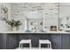 Charming bar with updated cabinets and countertops perfect for entertaining guests at 7520 Orpine N Dr, St Petersburg, FL 33702