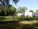 Expansive backyard surrounded by lush trees, offering a serene and private outdoor space at 851 Easy St, Brooksville, FL 34601