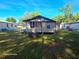 Spacious backyard with a single-story home, and plenty of room for outdoor activities at 851 Easy St, Brooksville, FL 34601