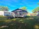 Spacious backyard showcasing a cozy home with fence, with ample space for outdoor enjoyment at 851 Easy St, Brooksville, FL 34601