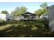 Large backyard with a single-story home, perfect for outdoor living and activities at 851 Easy St, Brooksville, FL 34601
