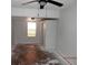 Spacious bedroom with a window and an open closet at 851 Easy St, Brooksville, FL 34601